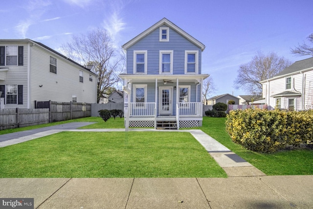 view of front facade featuring a porch and a front yard