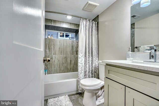 full bathroom featuring vanity, toilet, and shower / bath combo