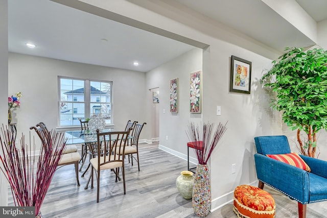 dining space featuring light hardwood / wood-style floors