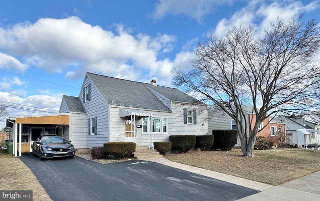 view of front of house featuring a carport