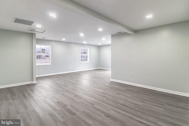 basement featuring dark wood-type flooring