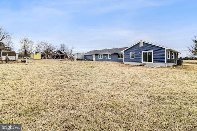 view of yard with central AC