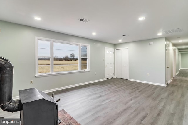 living room with light hardwood / wood-style flooring