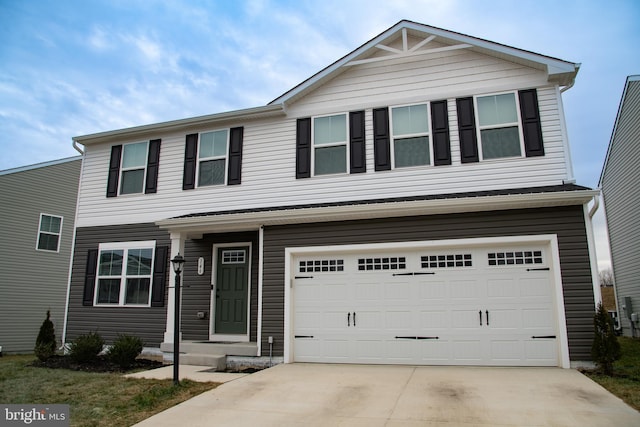 view of front of property featuring a garage