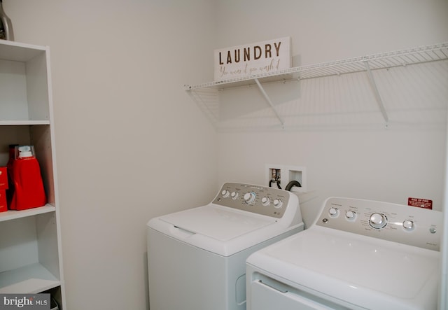 laundry room featuring washer and clothes dryer