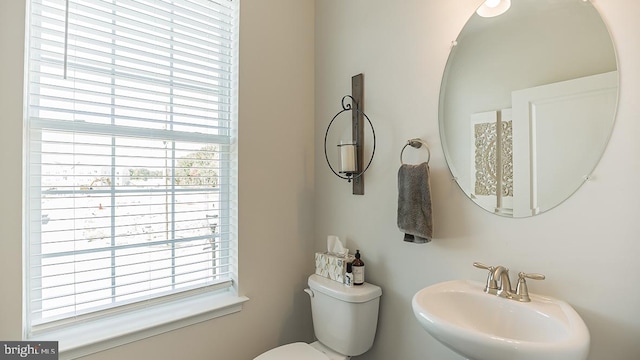 bathroom with sink and toilet