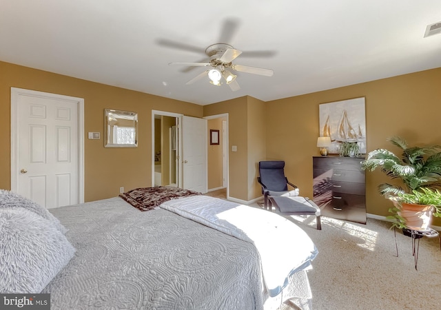 carpeted bedroom featuring ceiling fan