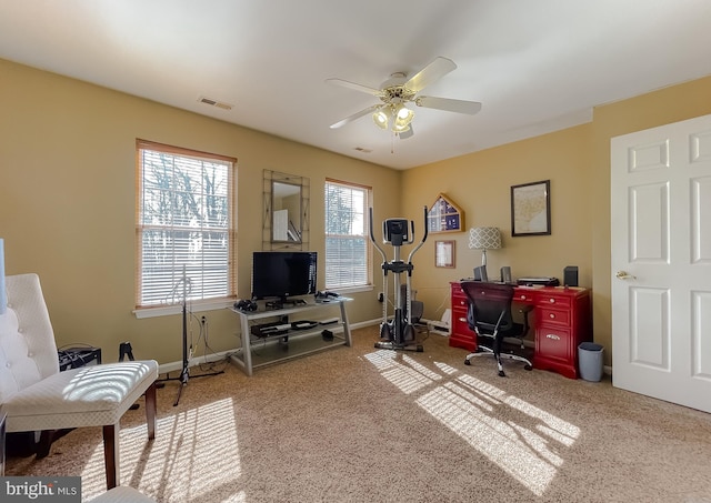 office area with carpet flooring and ceiling fan