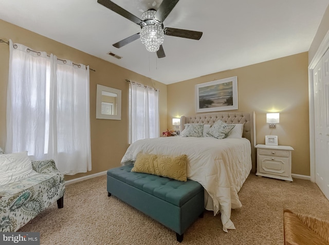 carpeted bedroom featuring ceiling fan