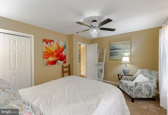 bedroom featuring light carpet, a closet, and ceiling fan