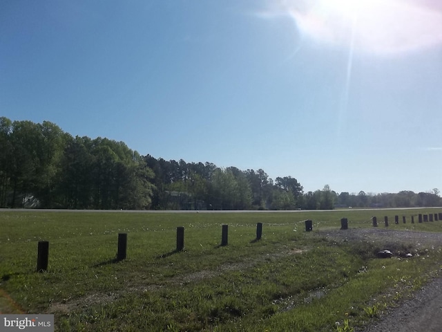 exterior space with a rural view