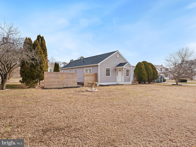 exterior space with a front lawn