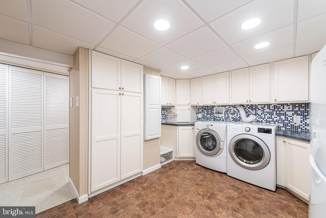 laundry area with cabinets and washer and dryer