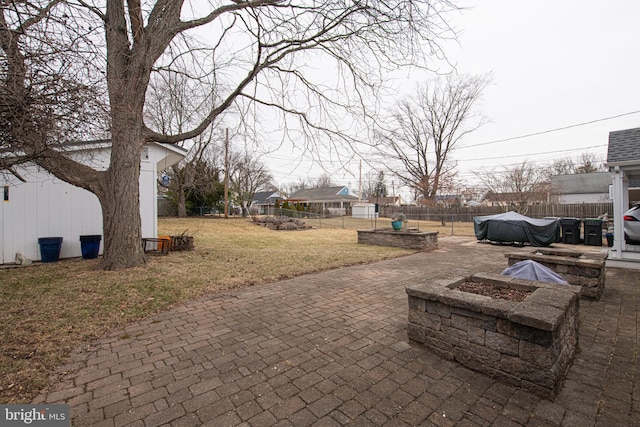 view of patio featuring a fire pit