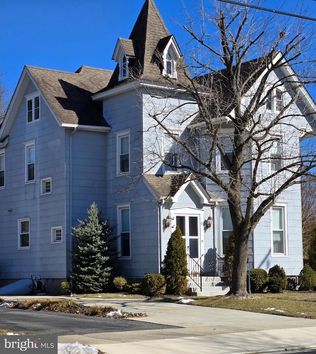 view of front of home with roof with shingles