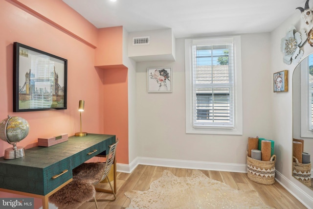 office space featuring light hardwood / wood-style floors