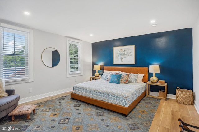 bedroom with light wood-type flooring