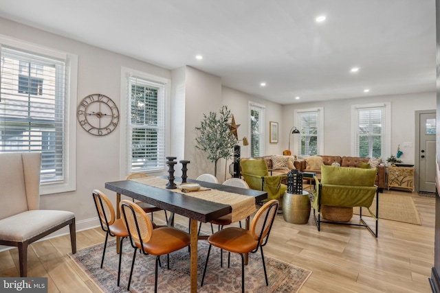 dining room with light wood-type flooring