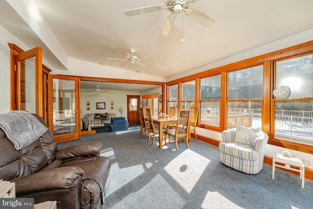 sunroom with vaulted ceiling and ceiling fan