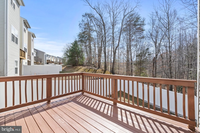 wooden deck featuring a residential view