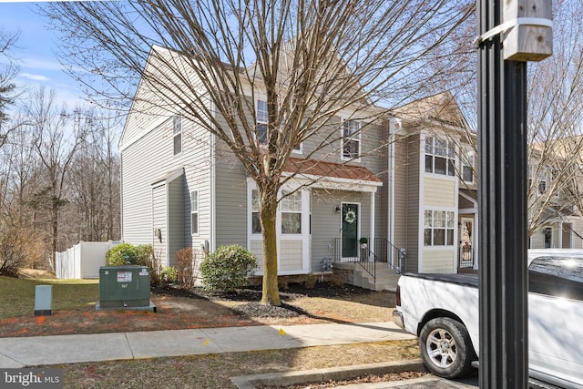 view of front of property with fence