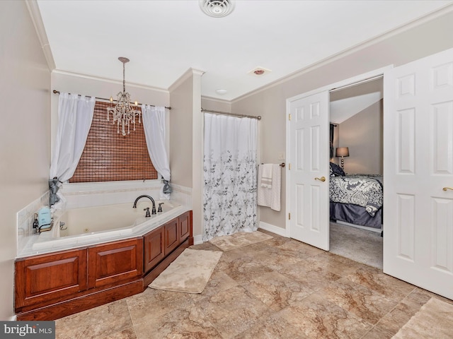 bathroom featuring a bathing tub and ornamental molding