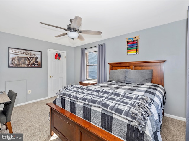 bedroom featuring light colored carpet and ceiling fan