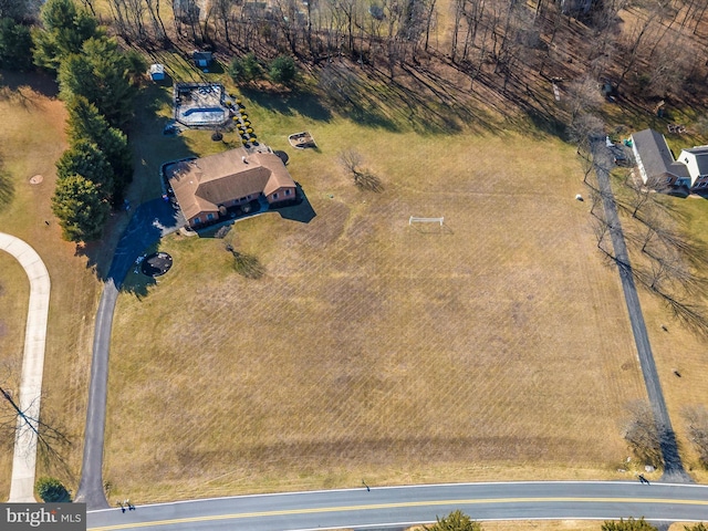 birds eye view of property featuring a rural view