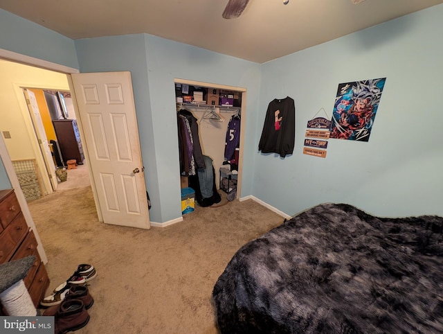 bedroom with light colored carpet and a closet