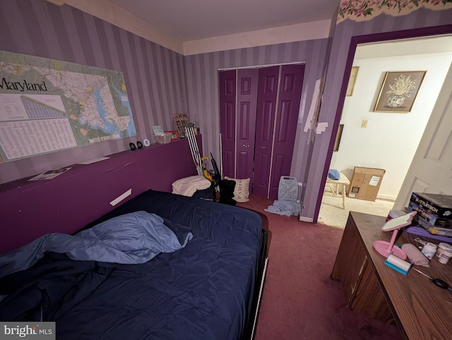 bedroom featuring carpet and a closet