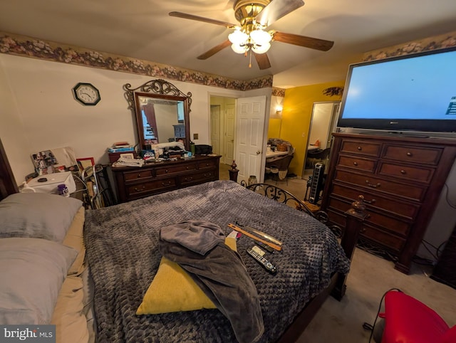 bedroom with light colored carpet and ceiling fan