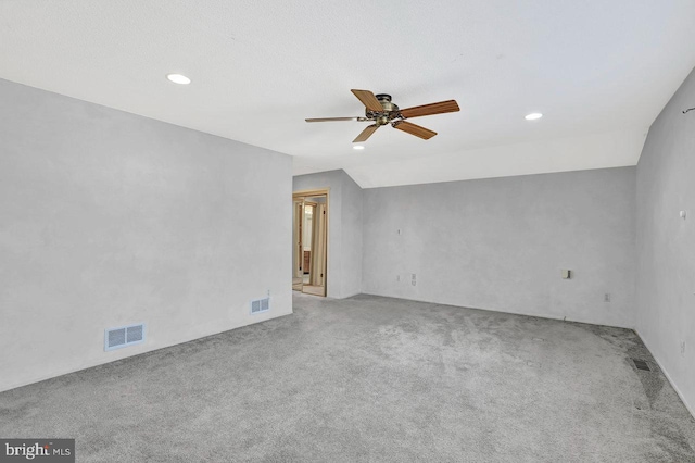 carpeted empty room with ceiling fan