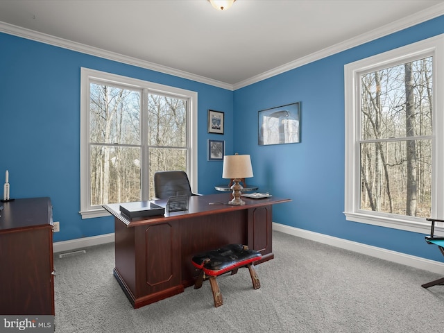 home office featuring light carpet, baseboards, and crown molding