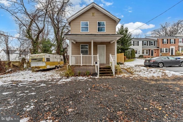 view of front property featuring a porch