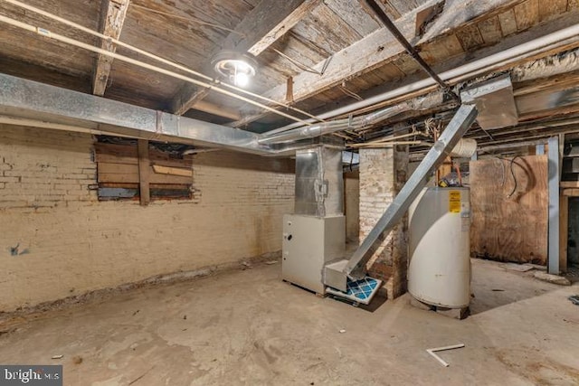 basement with heating unit and water heater