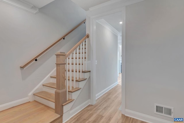 stairway with wood-type flooring