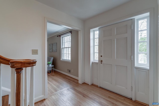 foyer entrance featuring light hardwood / wood-style floors