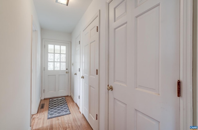 entryway with light wood-type flooring