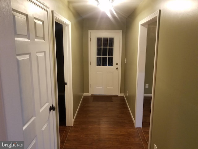 doorway to outside featuring dark hardwood / wood-style floors