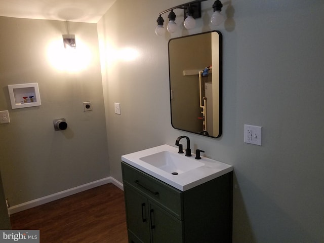 bathroom featuring vanity and wood-type flooring