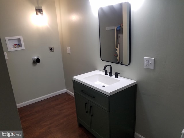 bathroom featuring wood-type flooring and vanity