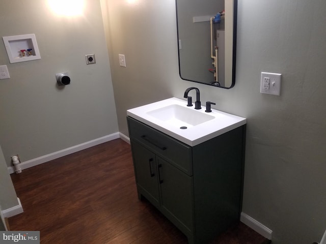 bathroom with vanity and hardwood / wood-style floors