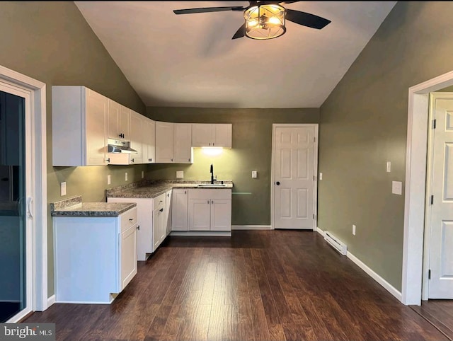 kitchen featuring sink, white cabinetry, vaulted ceiling, dark hardwood / wood-style floors, and ceiling fan