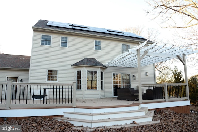 2477 Meade Dr, Vineland, NJ 08361 - rear view of property with outdoor lounge area, a pergola, a deck, and solar panels