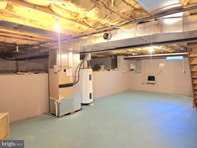 basement featuring heating unit, electric panel, and water heater