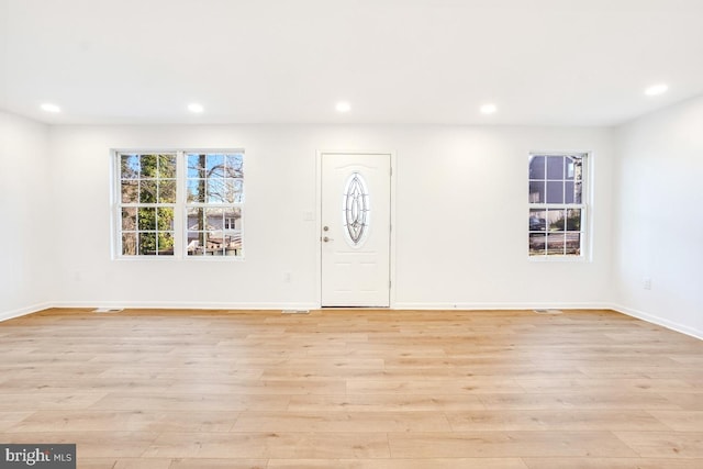 foyer entrance featuring light hardwood / wood-style flooring