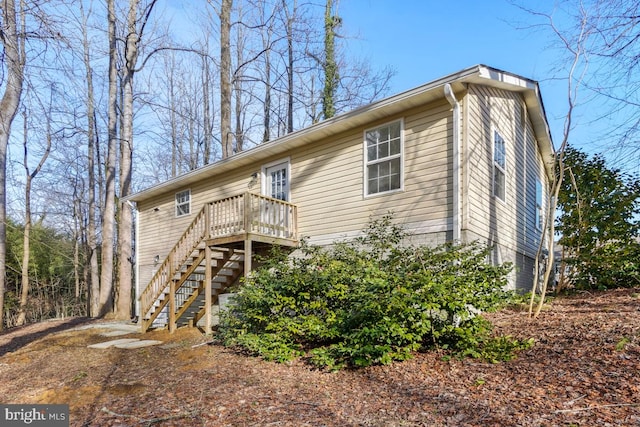 view of front of home with a deck