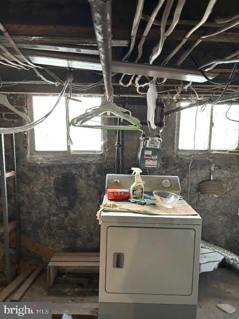 basement with washer / dryer and a healthy amount of sunlight