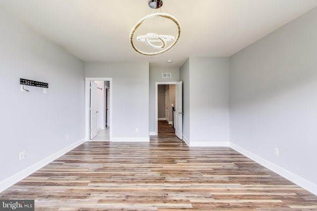 spare room featuring light hardwood / wood-style floors