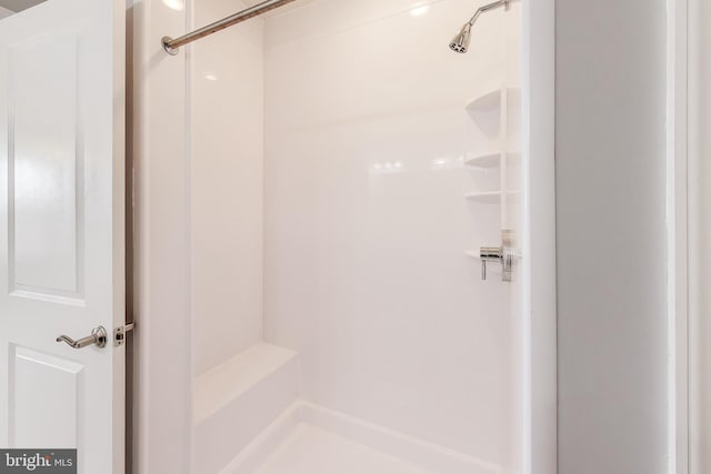 bathroom featuring walk in shower